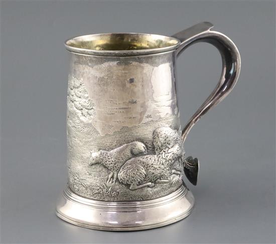 A George III large silver mug, later embossed with sheep grazing in a field with engraved inscription, Francis Crump 19 oz.